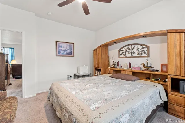 a spacious bathroom with a shower sink and mirror