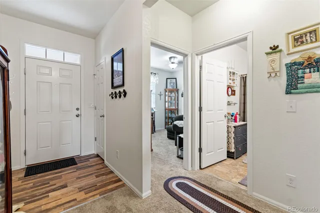 a bedroom with bed and a closet