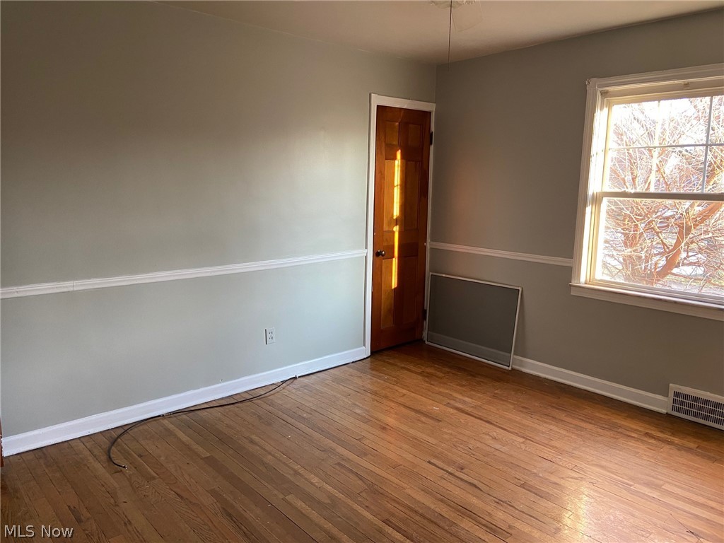 3827 Colony Road South Euclid, OH 44118 - Photo 19 of 29 Large bedroom with two closets, hardwood floors and plenty of light