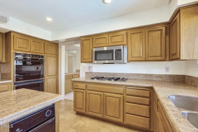 a bathroom with a sink and a window