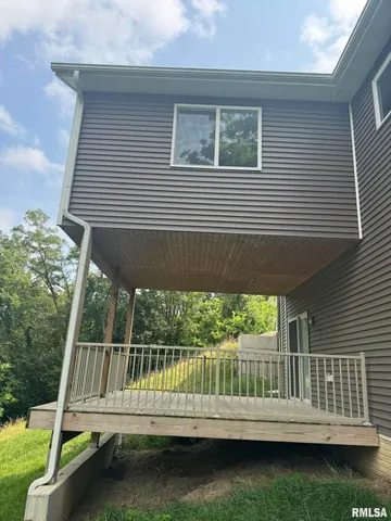 a view of a balcony with an outdoor space
