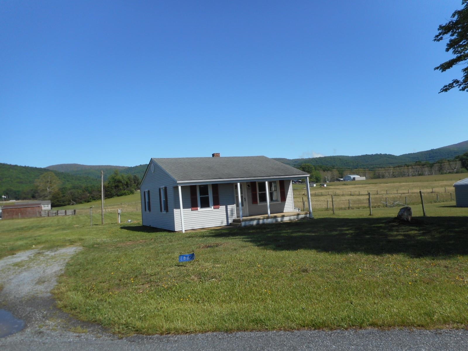 18874 Huckleberry Road Elkton, VA 22827 - Photo 9 of 23 a view of a house with a yard