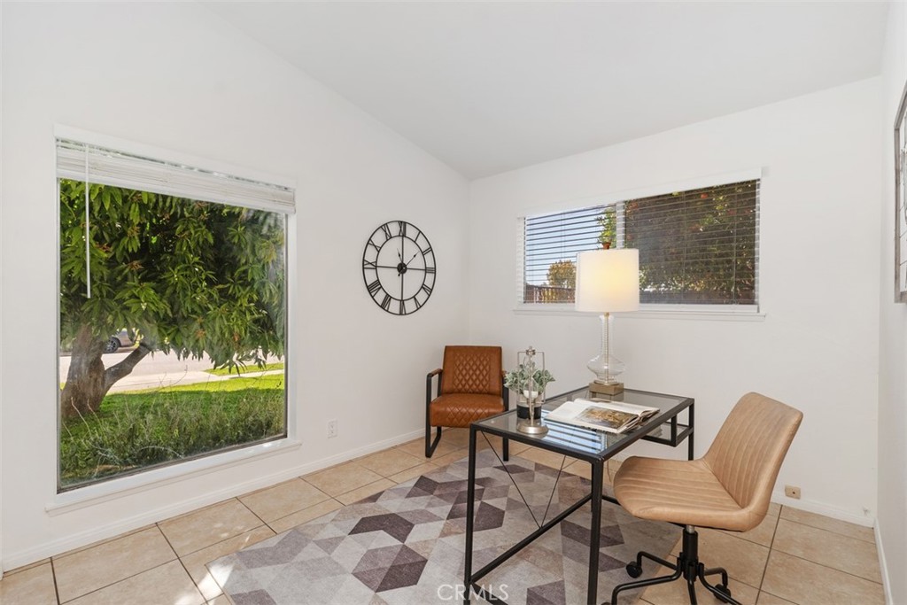 945 Redbud Street Brea, CA 92821 - Photo 21 of 31 a workspace with furniture and a window