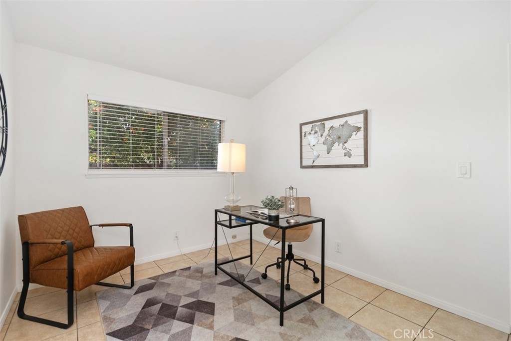 945 Redbud Street Brea, CA 92821 - Photo 23 of 31 a view of a workspace with furniture and a window