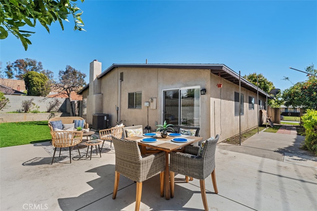 945 Redbud Street Brea, CA 92821 - Photo 27 of 31 a backyard of a house with table and chairs