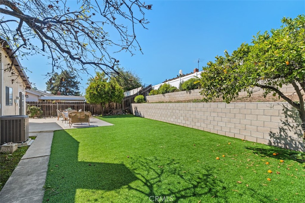 945 Redbud Street Brea, CA 92821 - Photo 29 of 31 a view of a backyard with a garden