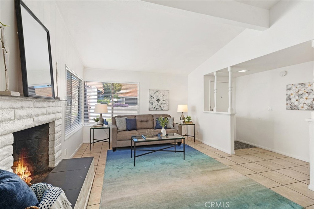 945 Redbud Street Brea, CA 92821 - Photo 8 of 31 a living room with furniture and a fireplace