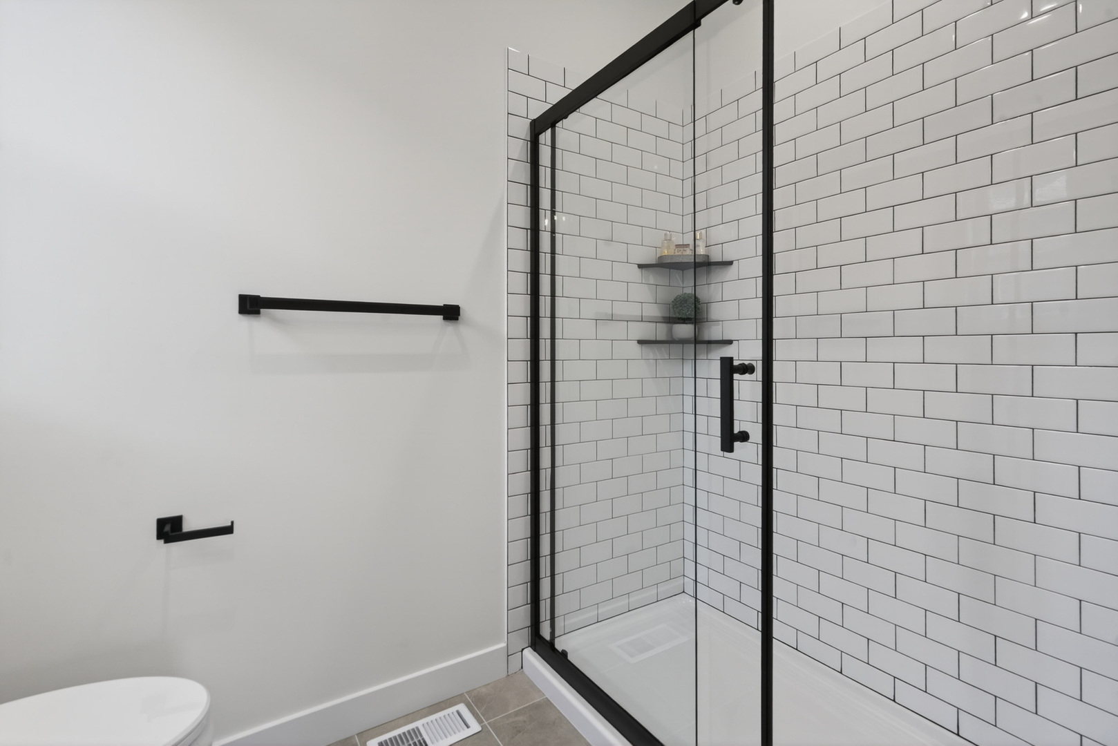 1002 Joshua Lane Genoa, IL 60135 - Photo 23 of 42 a bathroom with a shower