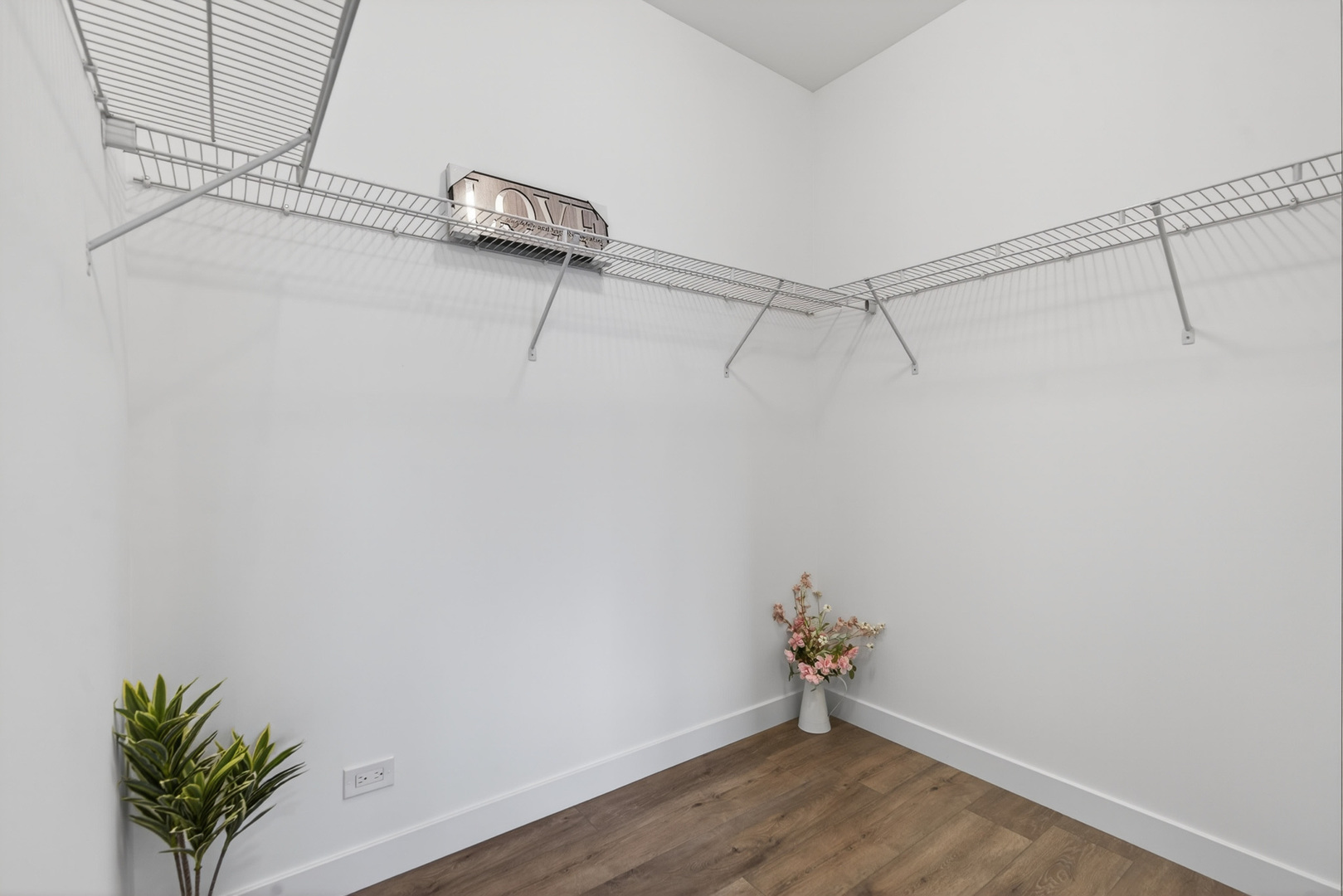 1002 Joshua Lane Genoa, IL 60135 - Photo 24 of 42 a view of a room with racks on the wall