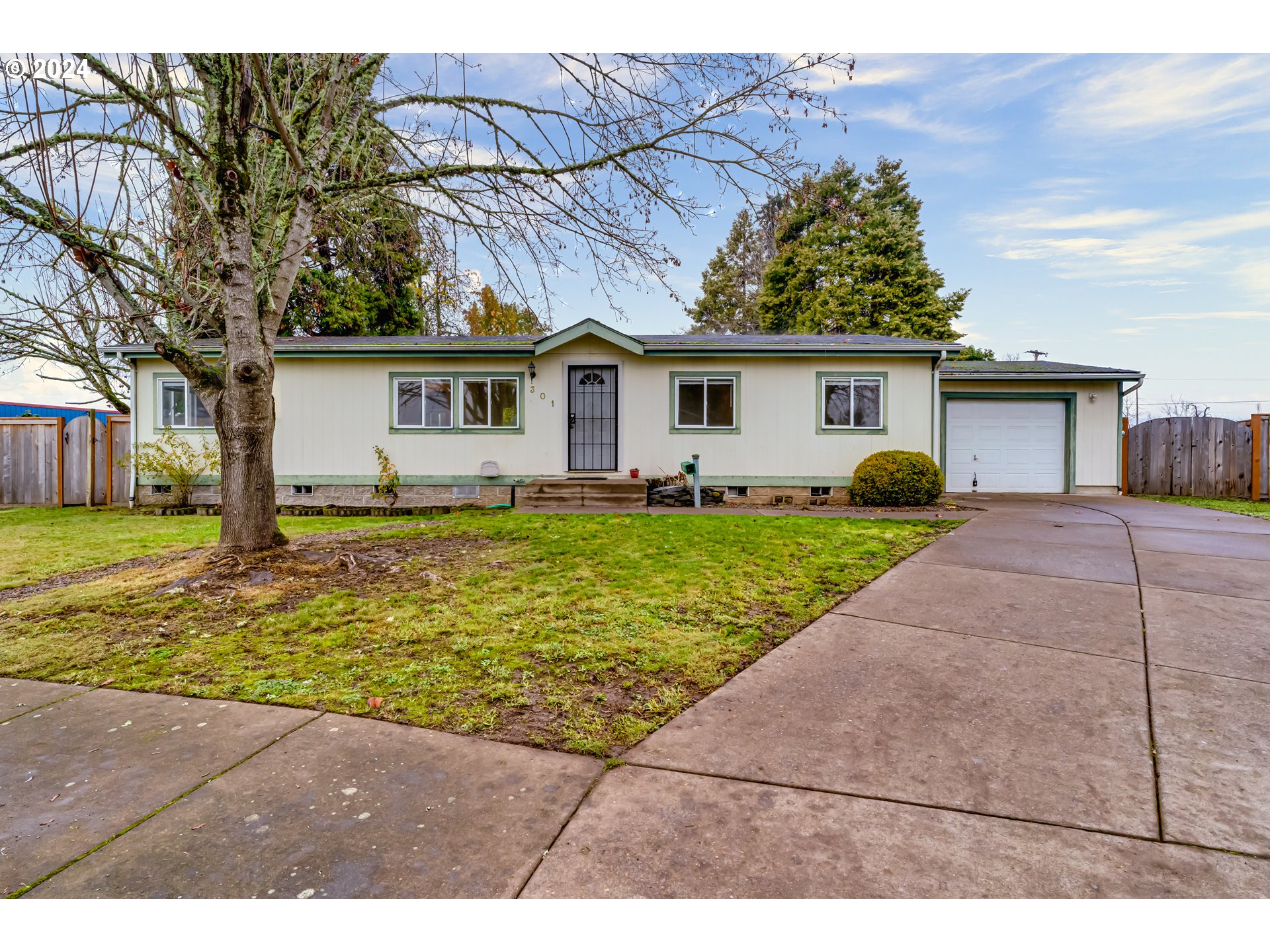 301 Smith Loop Springfield, OR 97478 - Photo 1 of 32 a view of a yard in front of a house