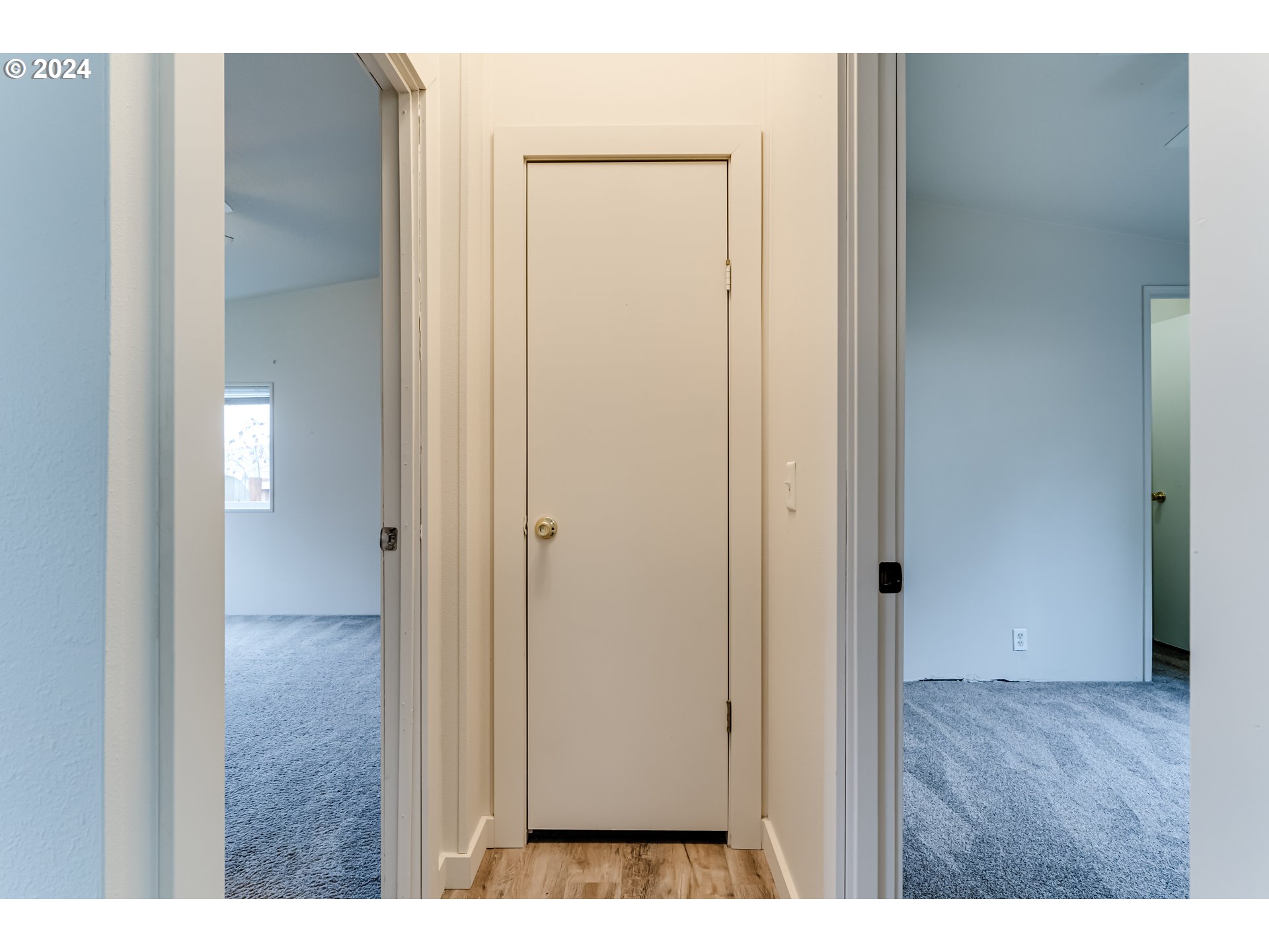 301 Smith Loop Springfield, OR 97478 - Photo 11 of 32 a view of an empty room with wooden floor