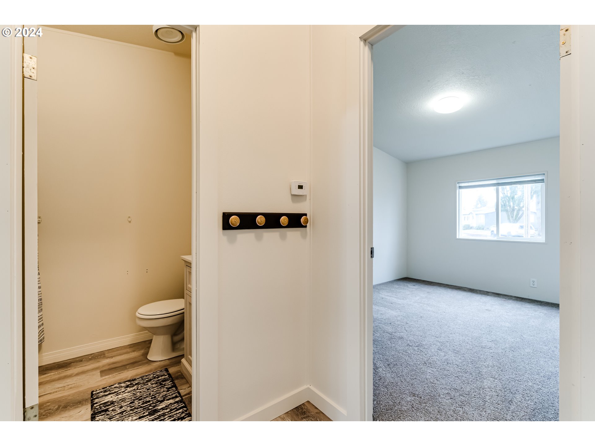 301 Smith Loop Springfield, OR 97478 - Photo 22 of 32 a bathroom with a toilet and a shower