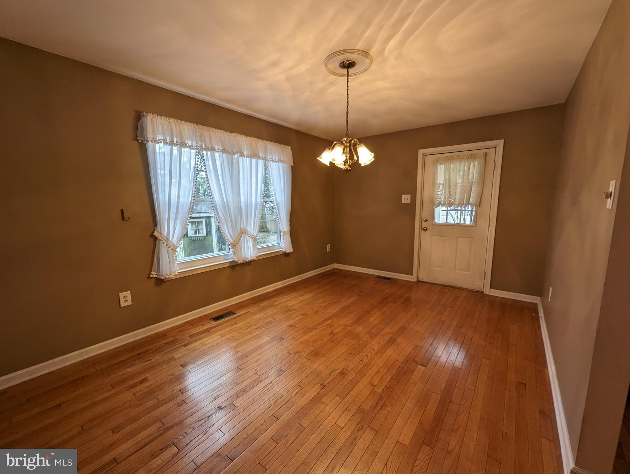612 Ridgeway Street Gloucester City, NJ 08030 - Photo 11 of 28 Formal dining room has side door w/exterior access