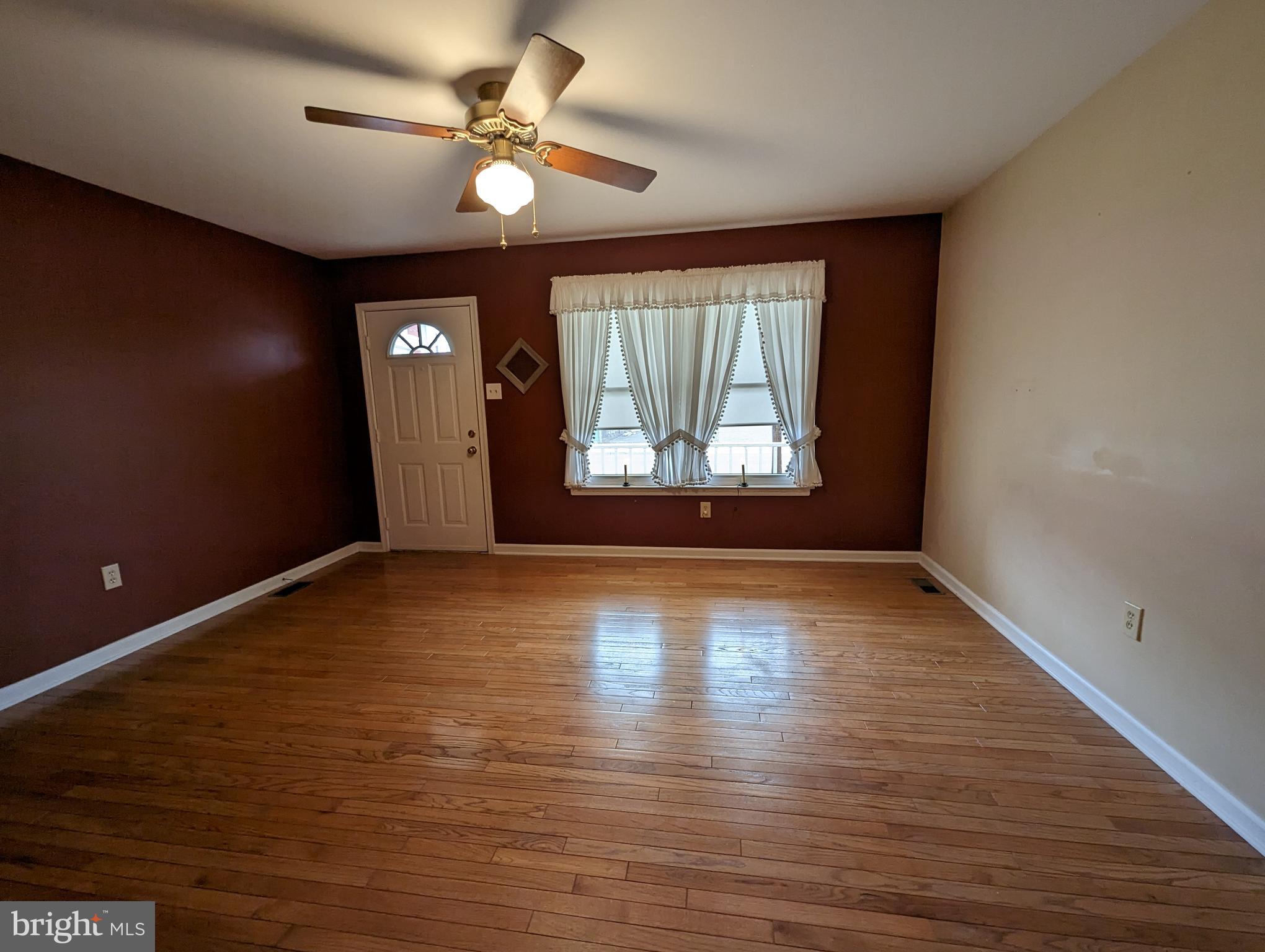 612 Ridgeway Street Gloucester City, NJ 08030 - Photo 5 of 28 Living room looks out on front porch.