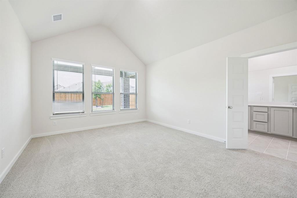 749 Lyft Lane Aledo, TX 76008 - Photo 15 of 29 Primary Suite in the Claret home plan by Trophy Signature Homes – REPRESENTATIVE PHOTO