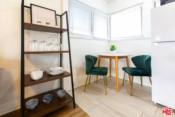 a view of dining room and wooden floor