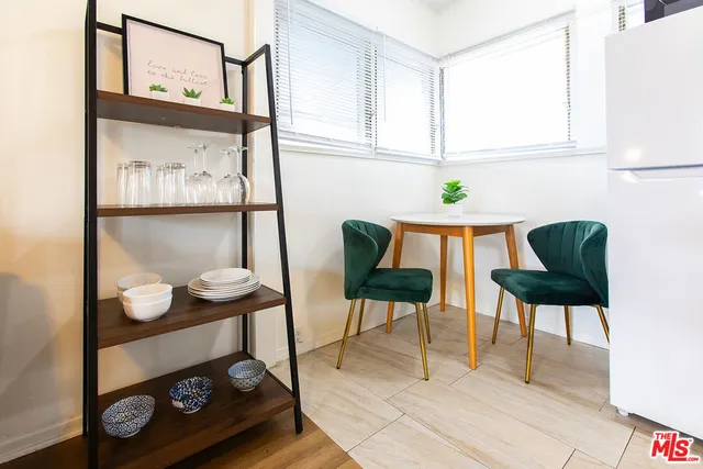 a view of dining room and wooden floor