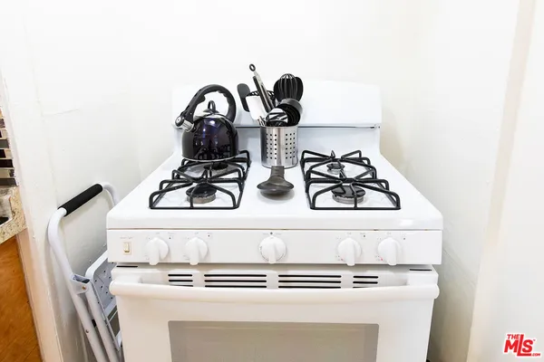a close view of stove with sink