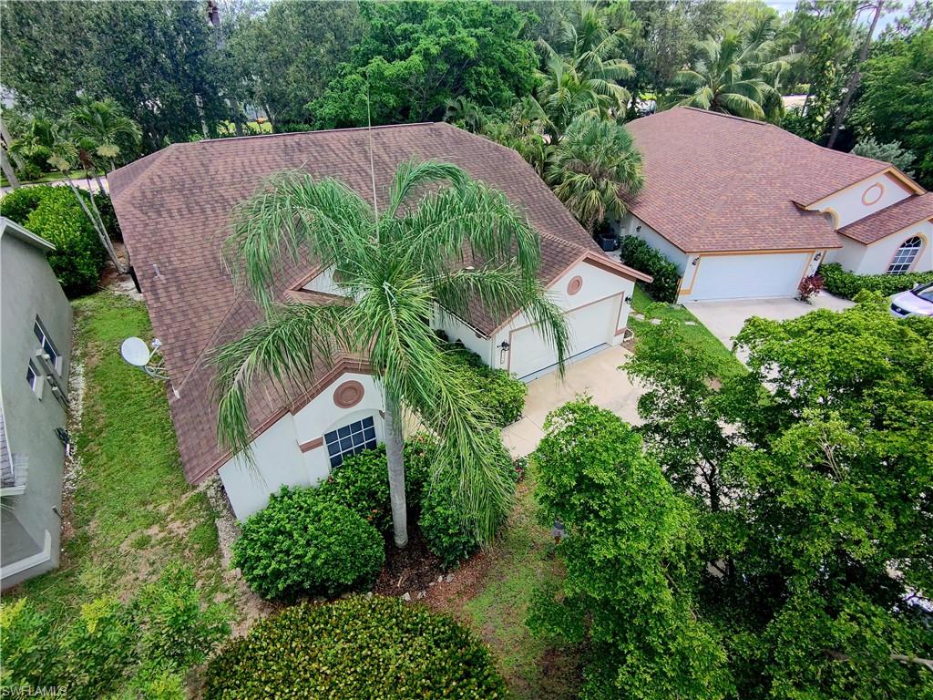 6708 Sloane Place Naples, FL 34104 - Photo 24 of 31 an aerial view of a house