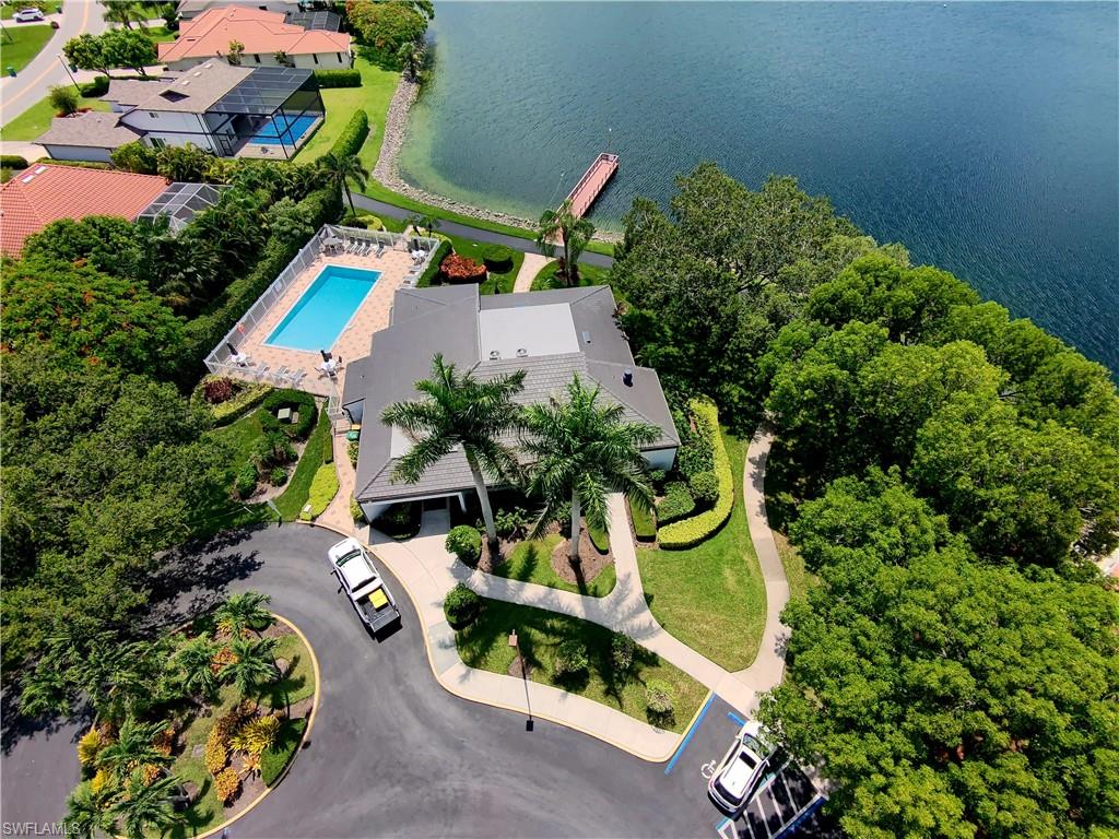 6708 Sloane Place Naples, FL 34104 - Photo 28 of 31 an aerial view of a house with a garden