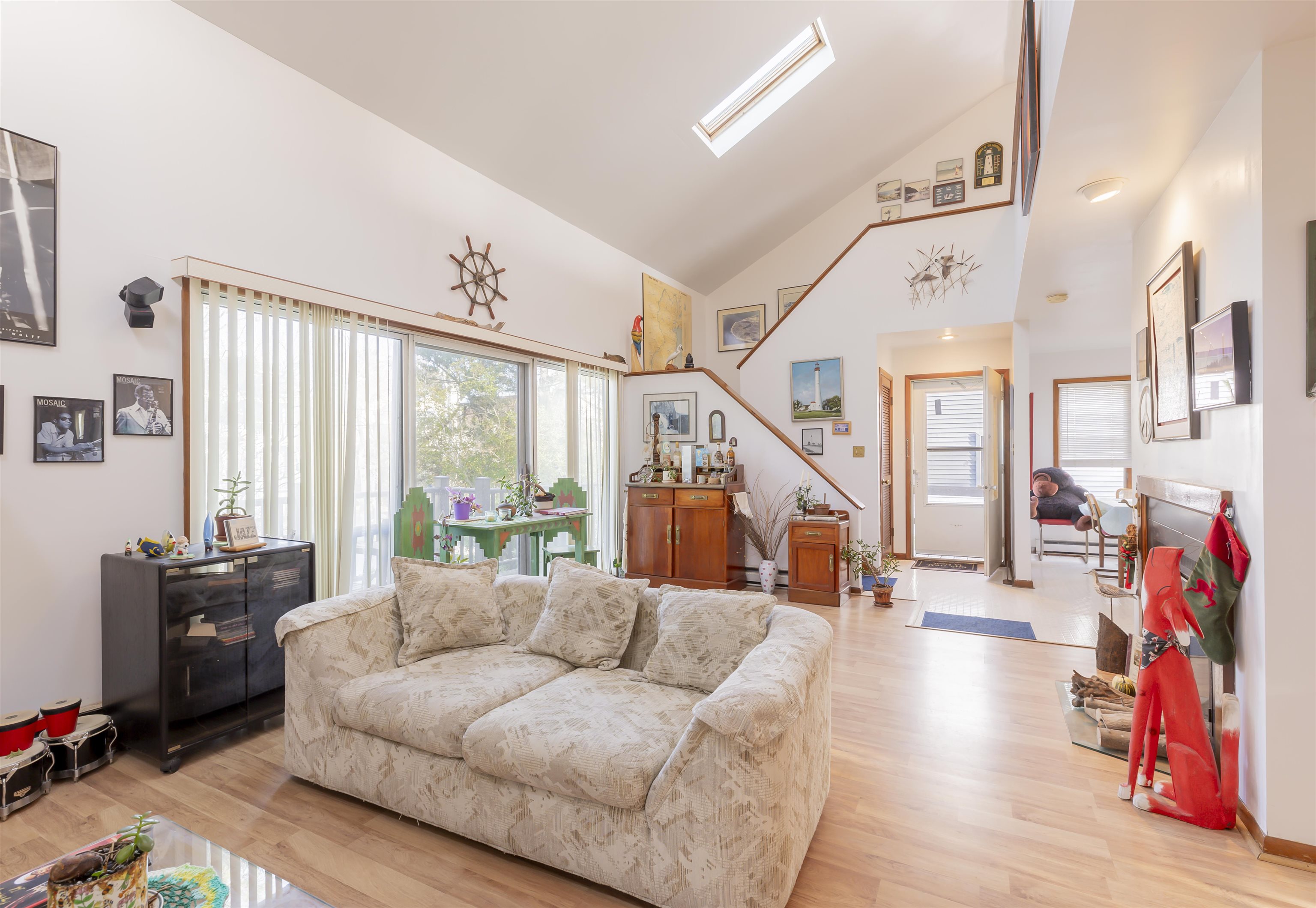 208 Princeton Avenue Cape May Point, NJ 08212 - Photo 21 of 49 a living room with furniture and a large window