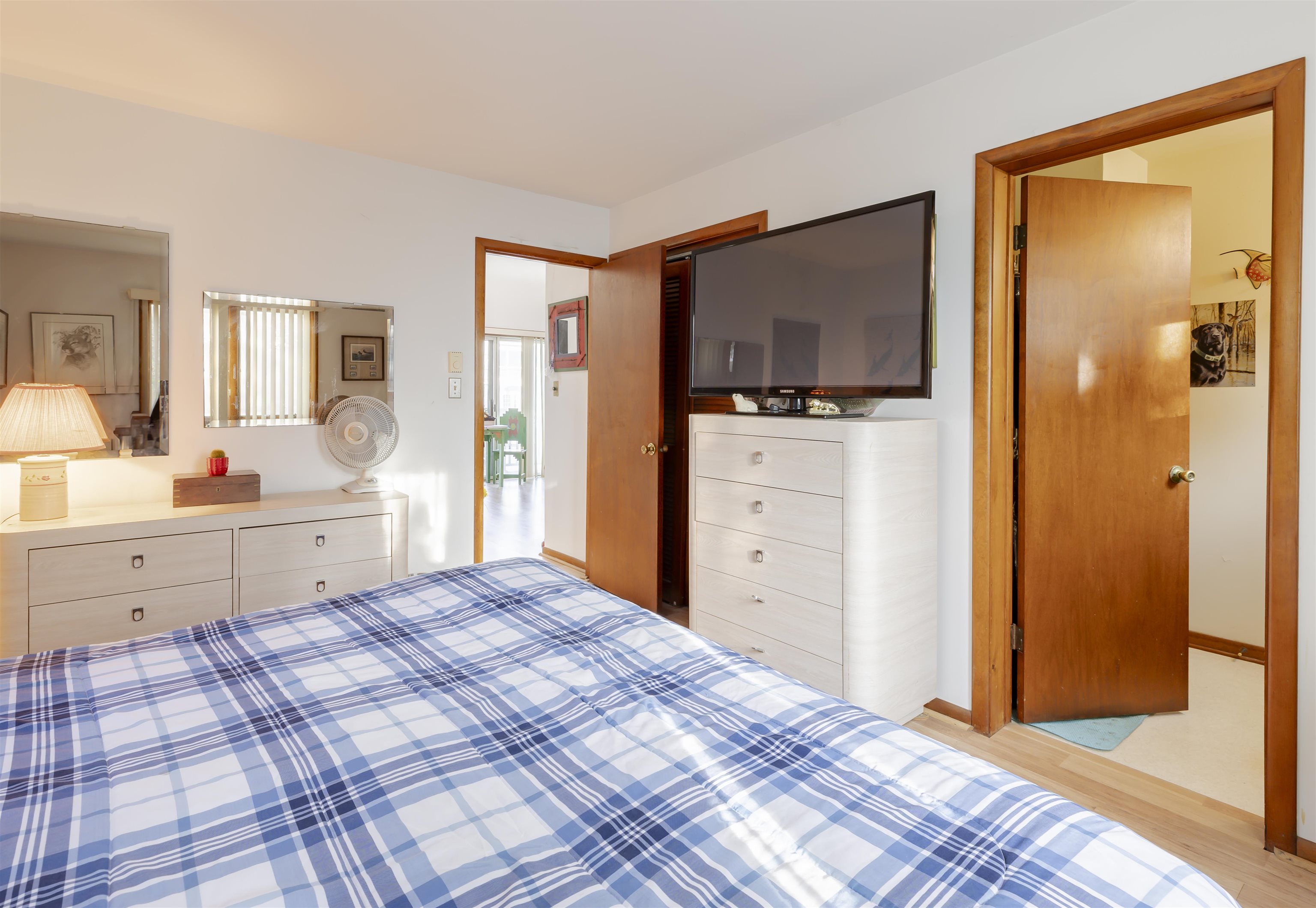 208 Princeton Avenue Cape May Point, NJ 08212 - Photo 24 of 49 a bedroom with a bed and a flat screen tv