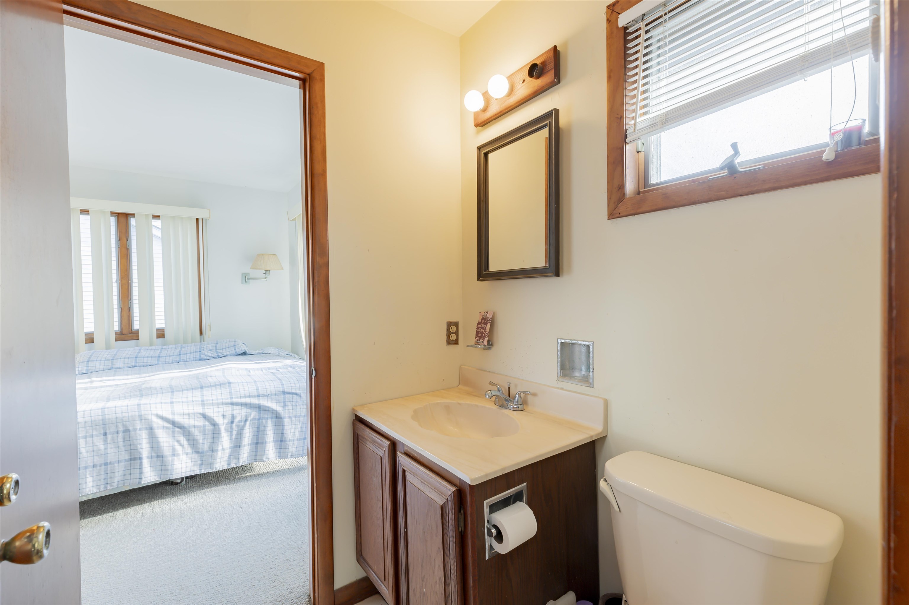 208 Princeton Avenue Cape May Point, NJ 08212 - Photo 35 of 49 a bathroom with a toilet sink and mirror