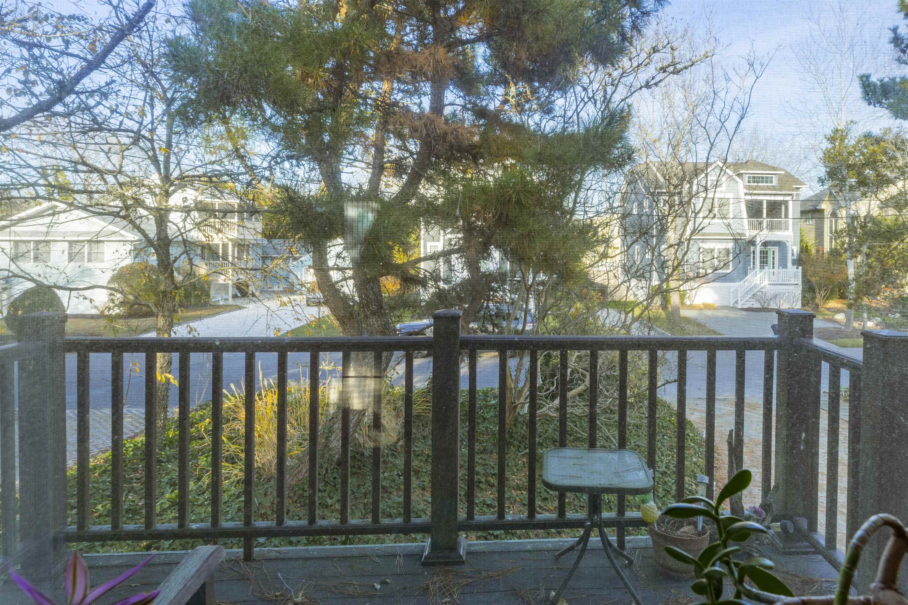 208 Princeton Avenue Cape May Point, NJ 08212 - Photo 42 of 49 a view of a balcony with chairs