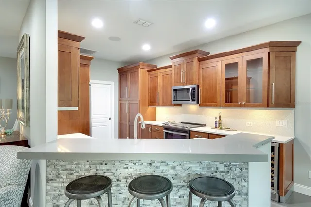 a kitchen with a stove and a sink