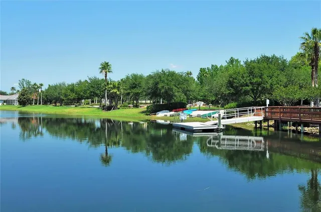 a view of small lake with boats
