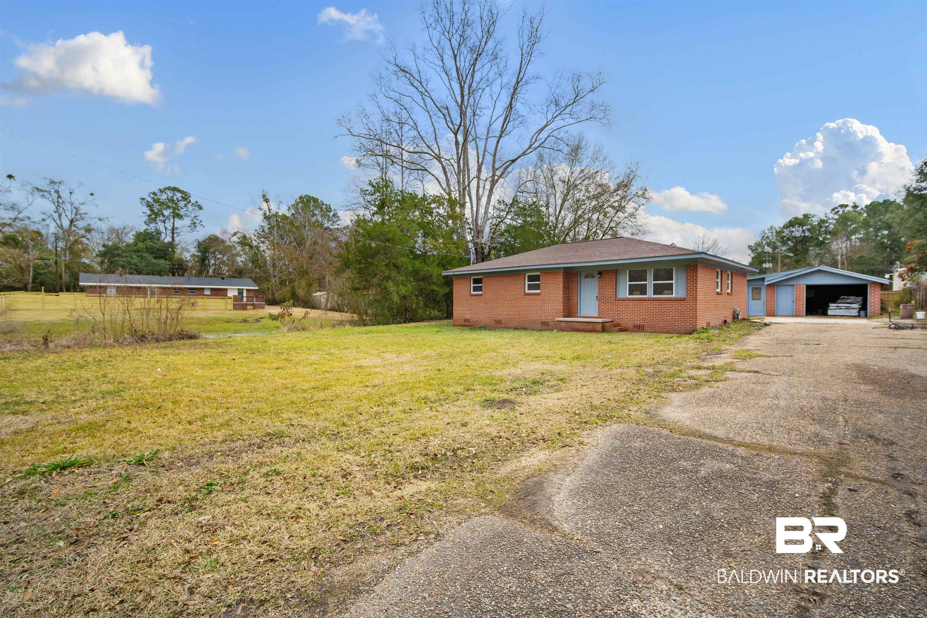 2119 Autrey Avenue Eight Mile, AL 36613 - Photo 2 of 22 Exterior space with a yard