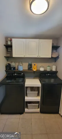a kitchen with a sink and a stove