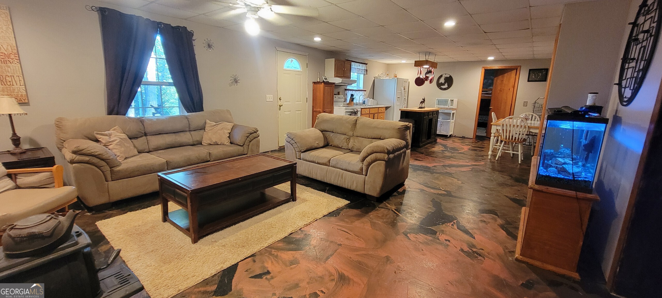 1605 Cody Road Mount Airy, GA 30563 - Photo 20 of 26 a living room with furniture and a window