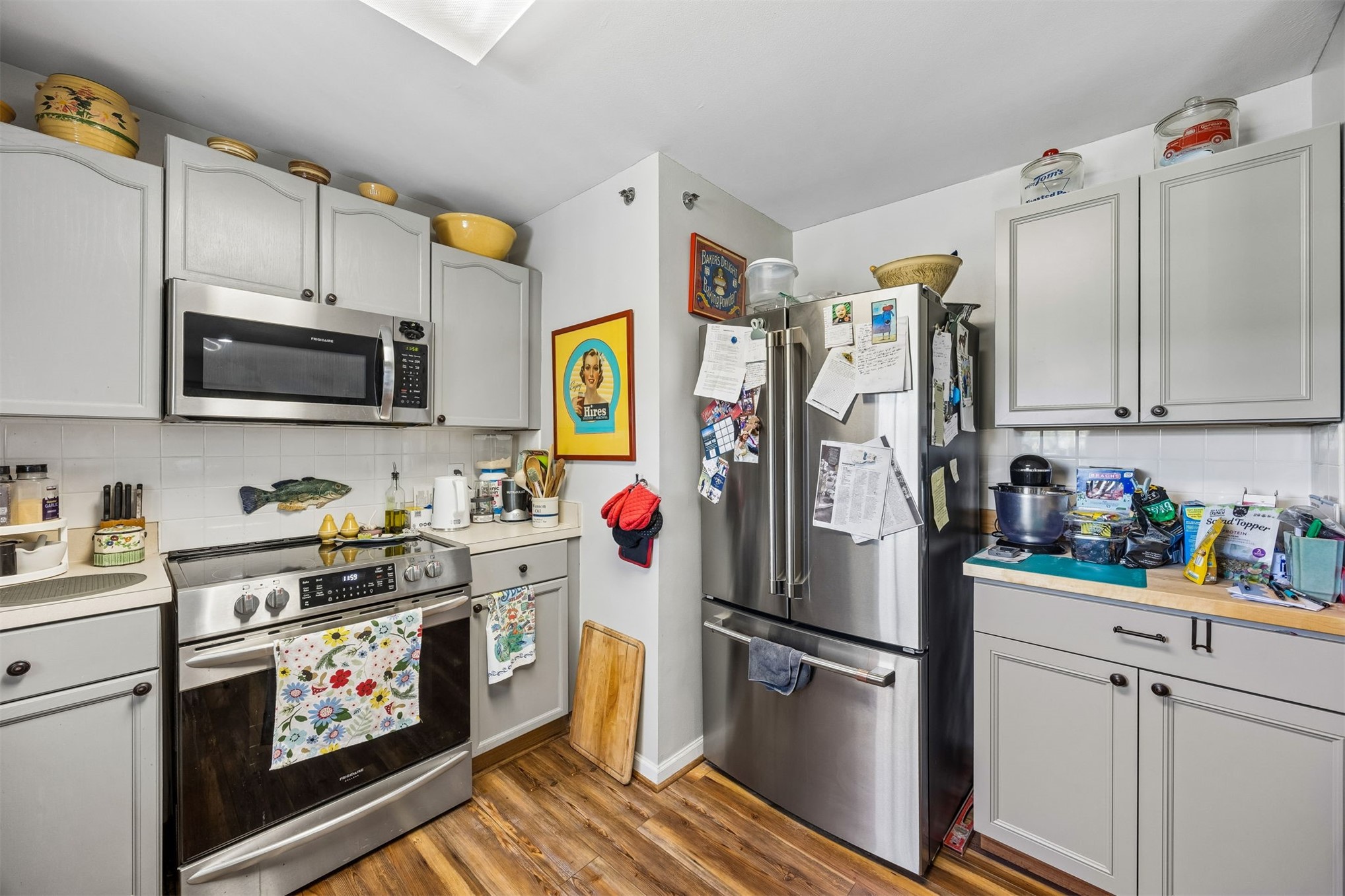 23525 Bahama Point, Unit 1621 Fernandina Beach, FL 32034 - Photo 11 of 68 a kitchen with stainless steel appliances a stove a refrigerator and a cabinets