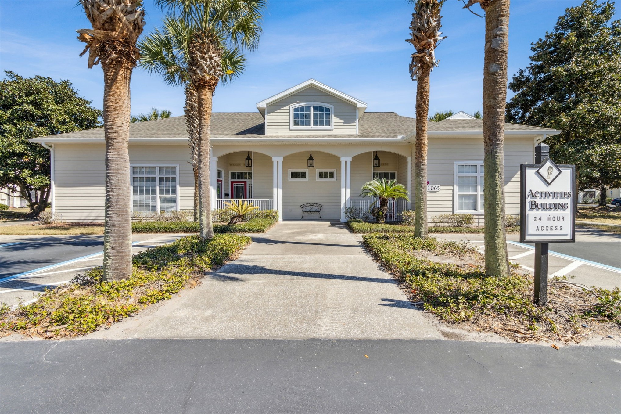 23525 Bahama Point, Unit 1621 Fernandina Beach, FL 32034 - Photo 47 of 68 a front view of a house with garden