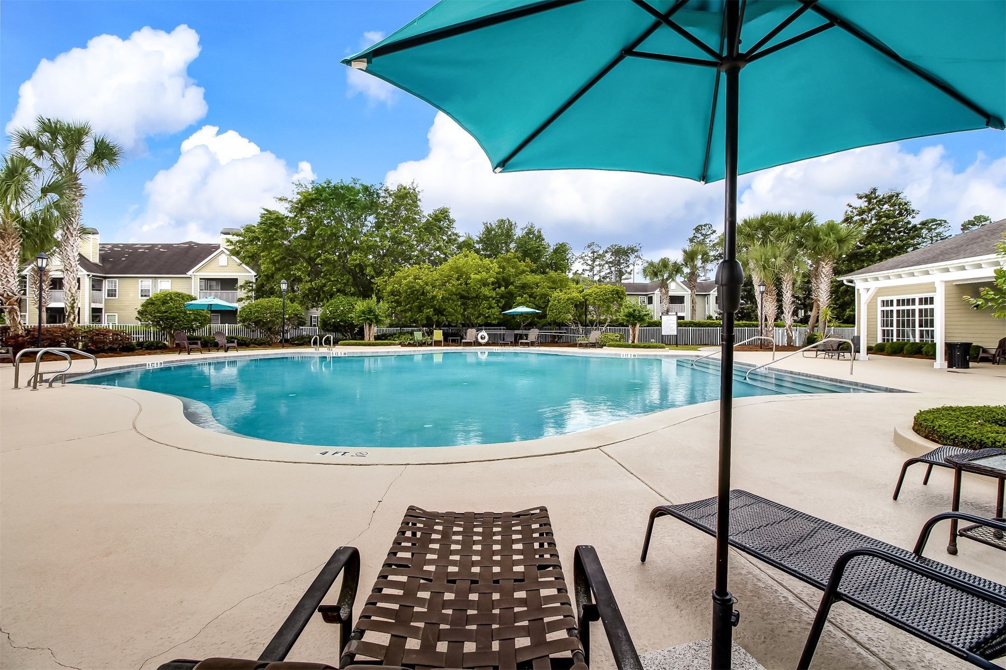 23525 Bahama Point, Unit 1621 Fernandina Beach, FL 32034 - Photo 57 of 68 a view of a swimming pool with a patio