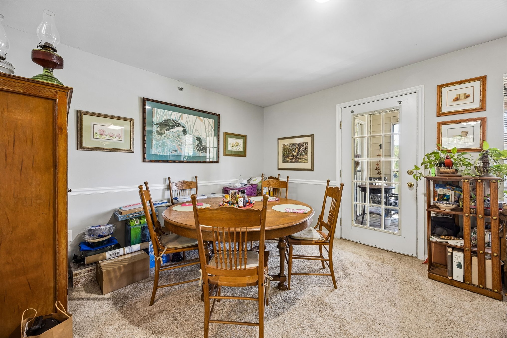 23525 Bahama Point, Unit 1621 Fernandina Beach, FL 32034 - Photo 6 of 68 a view of a dining room with furniture and chandelier