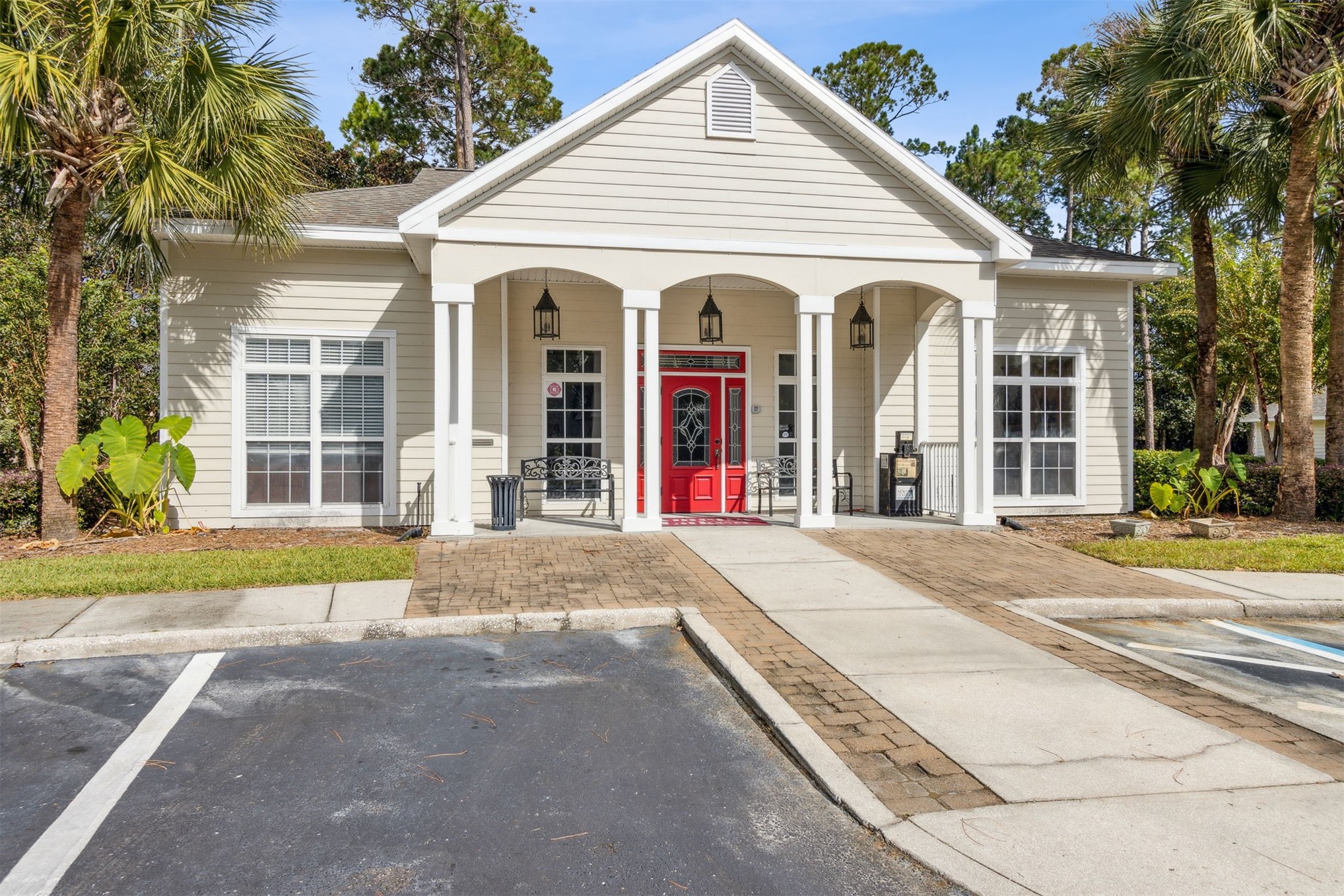 23525 Bahama Point, Unit 1621 Fernandina Beach, FL 32034 - Photo 67 of 68 a view of a white house with a yard and plants