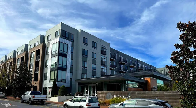 a front view of a building with street view