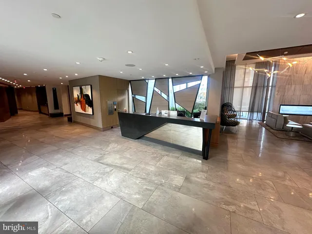 a view of a hall with stairs