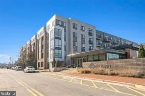 a view of a building with a street