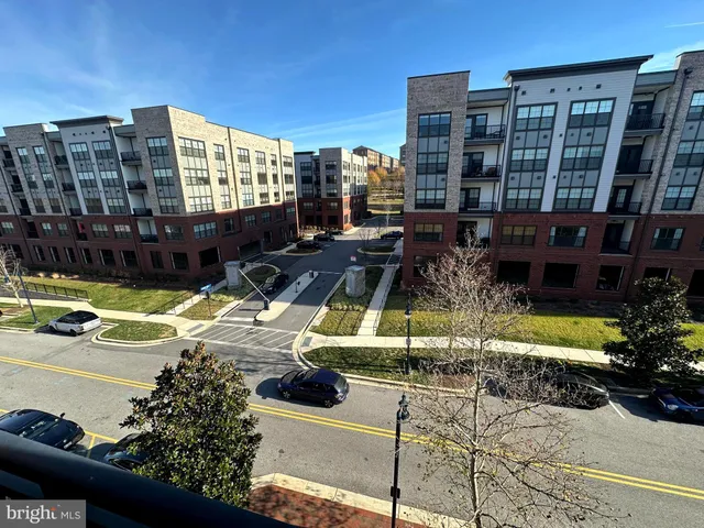 a view of a swimming pool with a lounge chairs