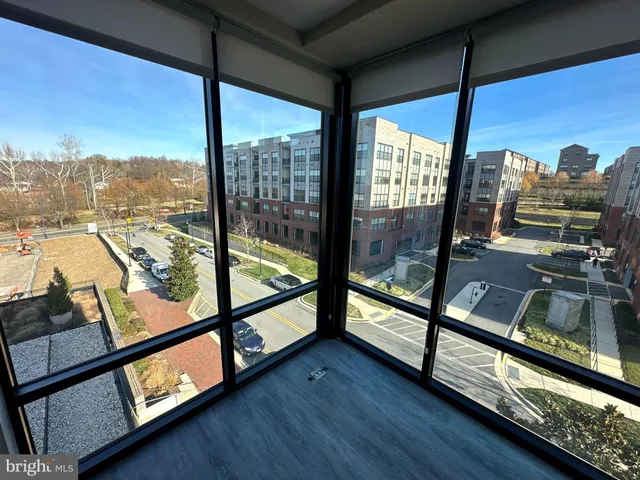 a view of a balcony with city view