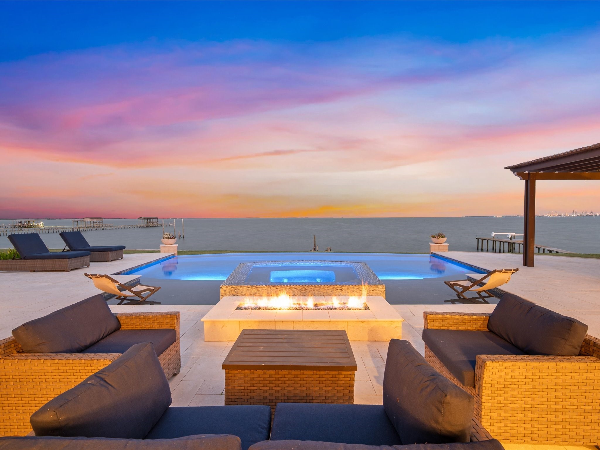 ENJOY BAYFRONT LIVING AT ITS' FINEST WITH SPECTACULAR VIEWS AND OUTDOOR AMENITIES LIKE THE INFINITY EDGE POOL WITH GLASS TILE SURROUND, WET EDGE SPA, FIREPIT AND PERGOLA FOR EXTENSIVE OUTDOOR ENTERTAINING.