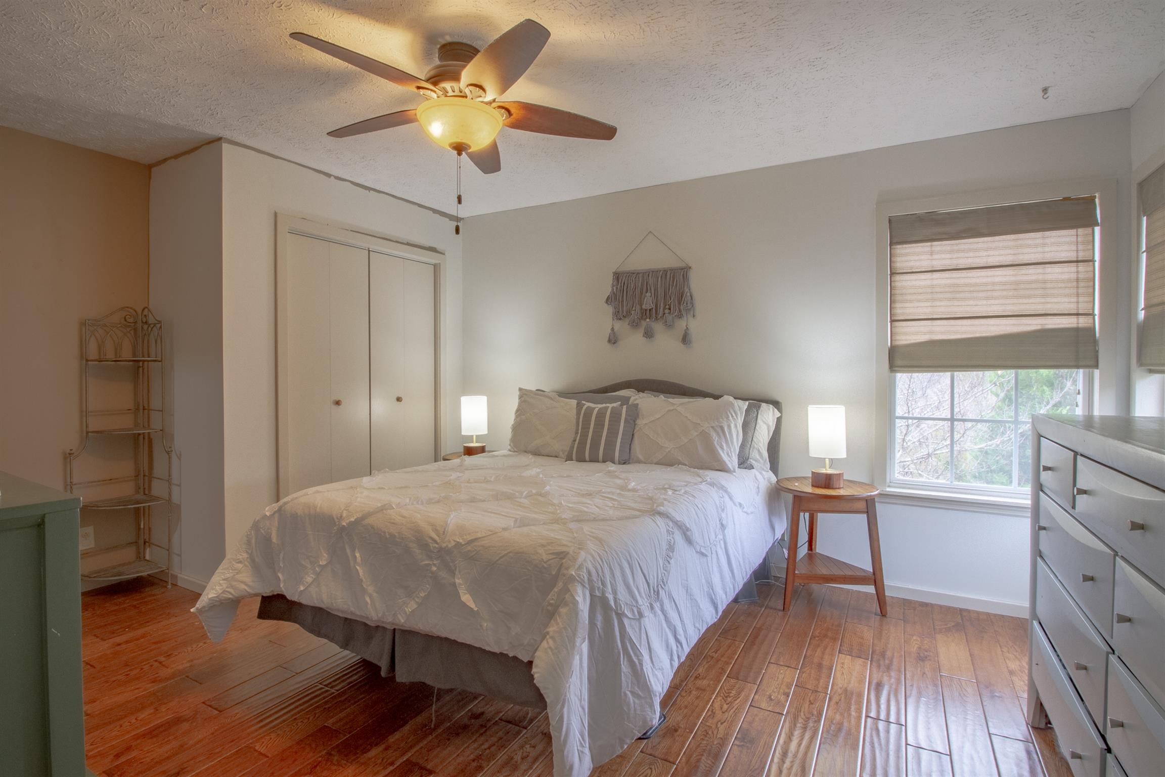 6990 Hoods Branch Road Springfield, TN 37172 - Photo 17 of 23 a bedroom with a bed and a window