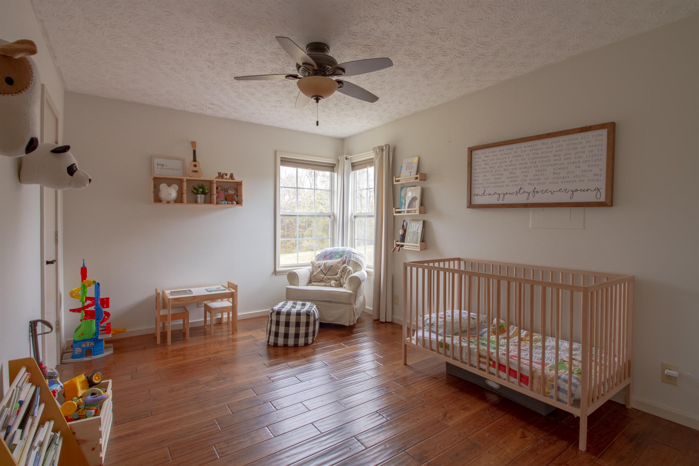 6990 Hoods Branch Road Springfield, TN 37172 - Photo 18 of 23 a living room with furniture and a wooden floor