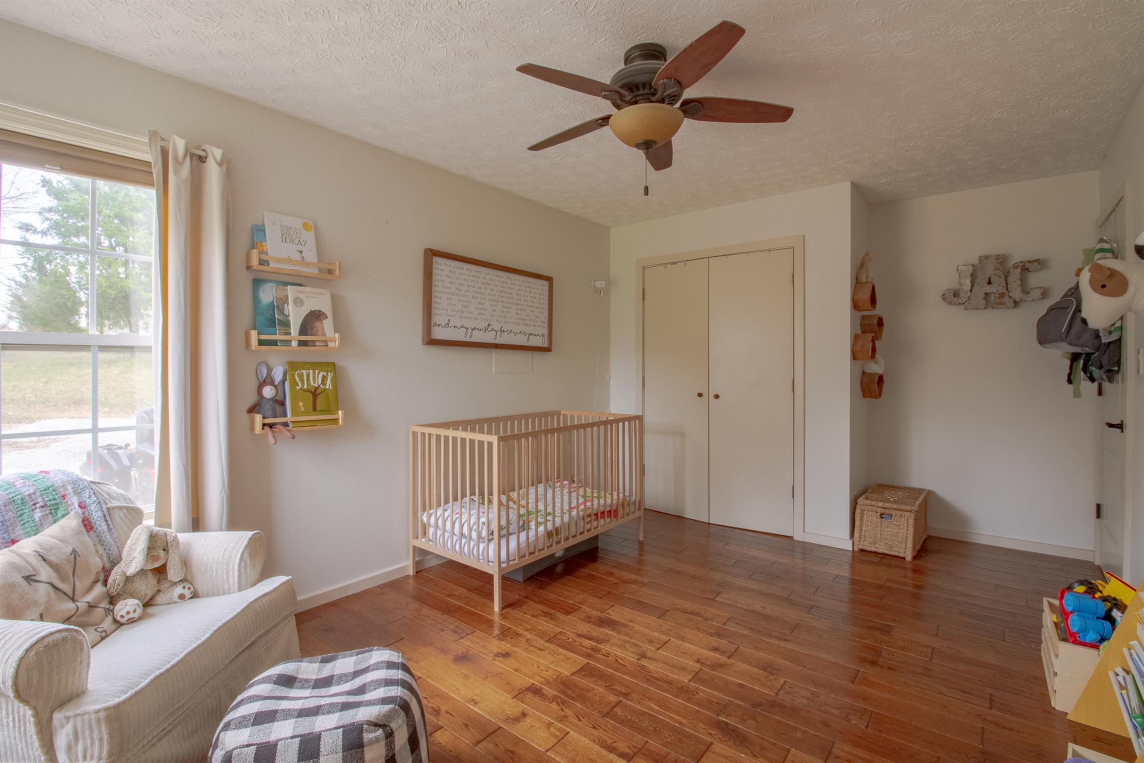 6990 Hoods Branch Road Springfield, TN 37172 - Photo 19 of 23 a bedroom with furniture and a window
