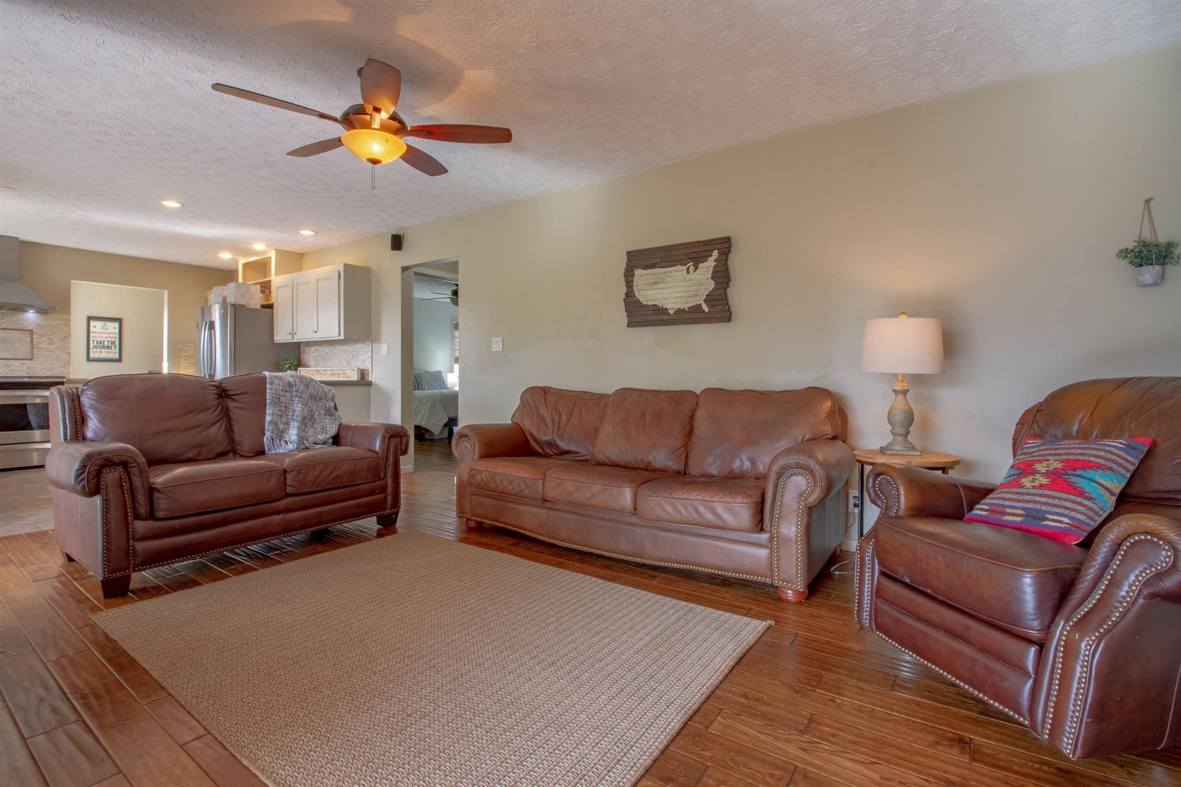 6990 Hoods Branch Road Springfield, TN 37172 - Photo 8 of 23 a living room with furniture and a lamp