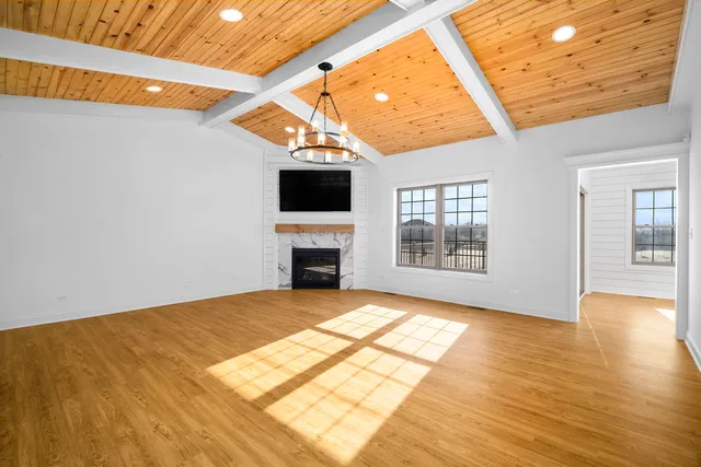 a kitchen with a refrigerator and a sink