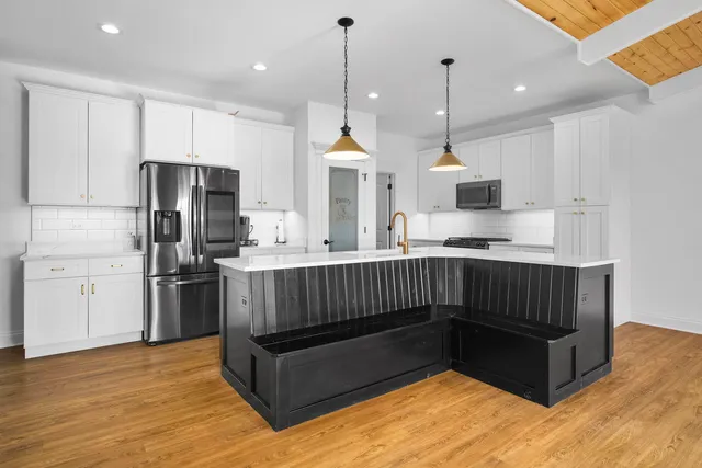 a view of storage and utility room with washer and dryer
